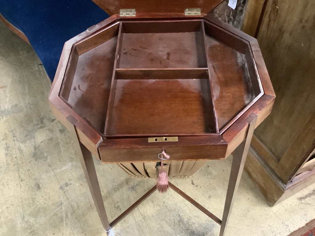 A George III banded mahogany octagonal topped work table